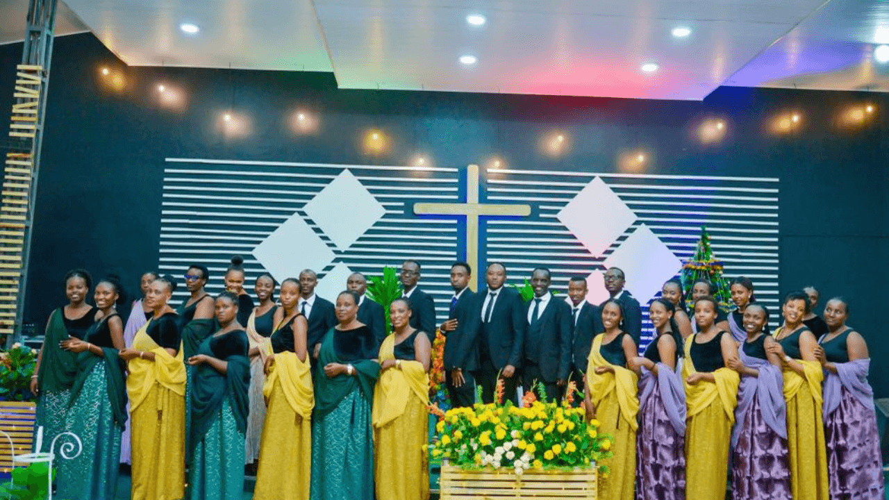 Worship service with people raising their hands in praise
